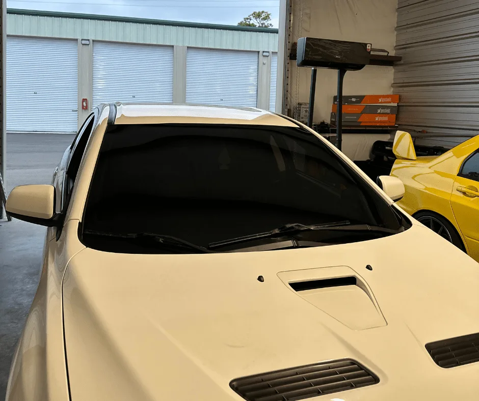 Mitsubishi Lancer with professional mobile car window tinting Wilmington, NC by NVS Customs