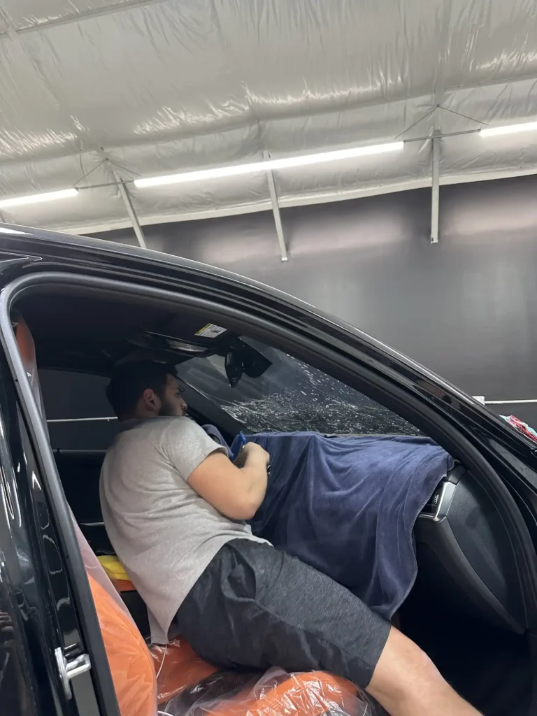 Before-and-after images of tinted vehicle windows.