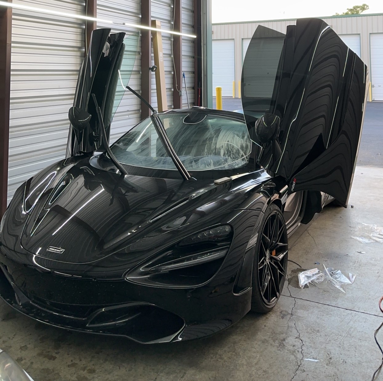 Vehicle with iridescent wrap installed by NVS CUSTOMS in Belville, NC displaying a vibrant color-shifting effect.