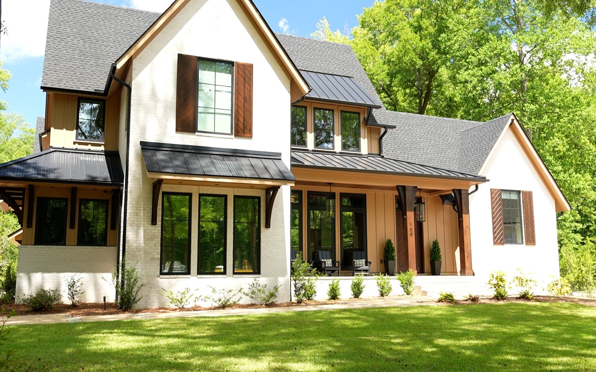 Residential window tint film on a modern home in a Wilmington NC neighborhood, reducing heat and UV exposure.